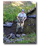 Kevin McAlerney conducting watershed monitoring in Joseph Creek.