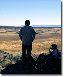 Paul Bailey and Mary Yamagiwa look over Fairchild Wetland.