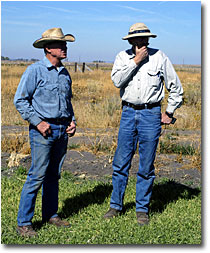John Flournoy and Cliff Harvey talk over work done on the Likely Land and Livestock Ranch.