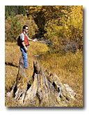Marty Yamagiwa, fisheries biologist stands near the photo point of an old stump on Cold Creek.